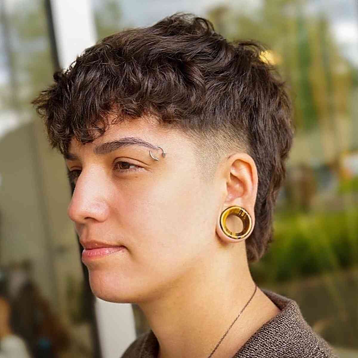 androgynous cool mohawk with shaved sides