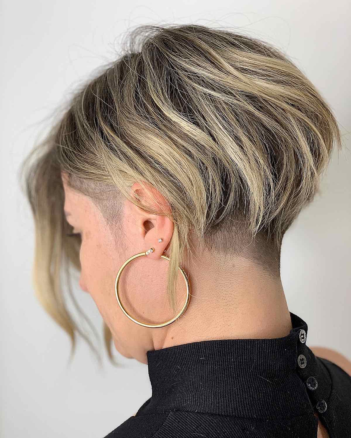 blonde short hair with an undercut