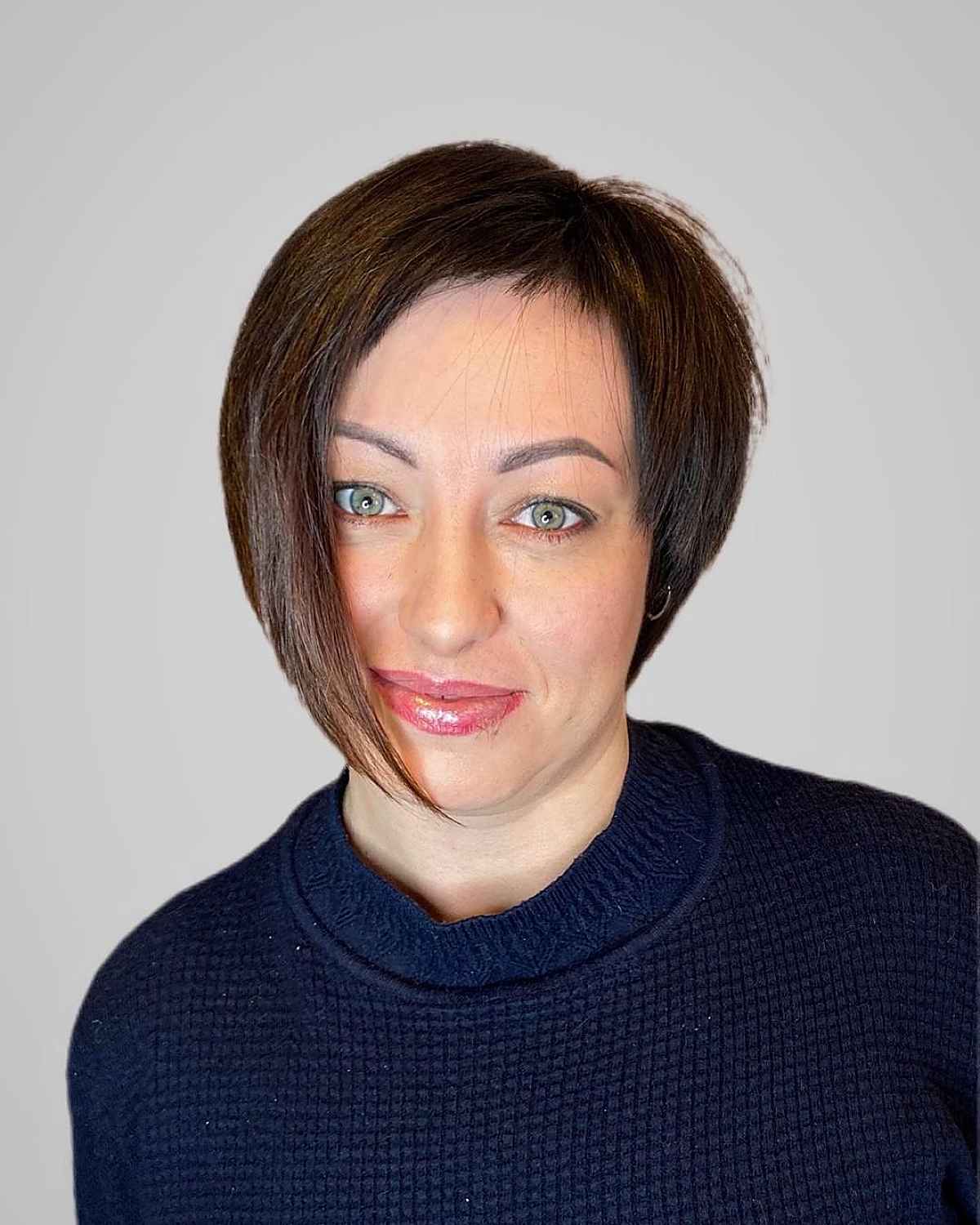 chin length asymmetrical bob for ladies over 40 with thin hair