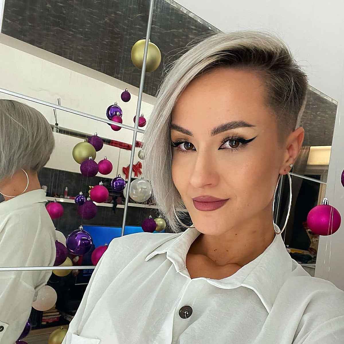 chin length blonde pixie bob undercut