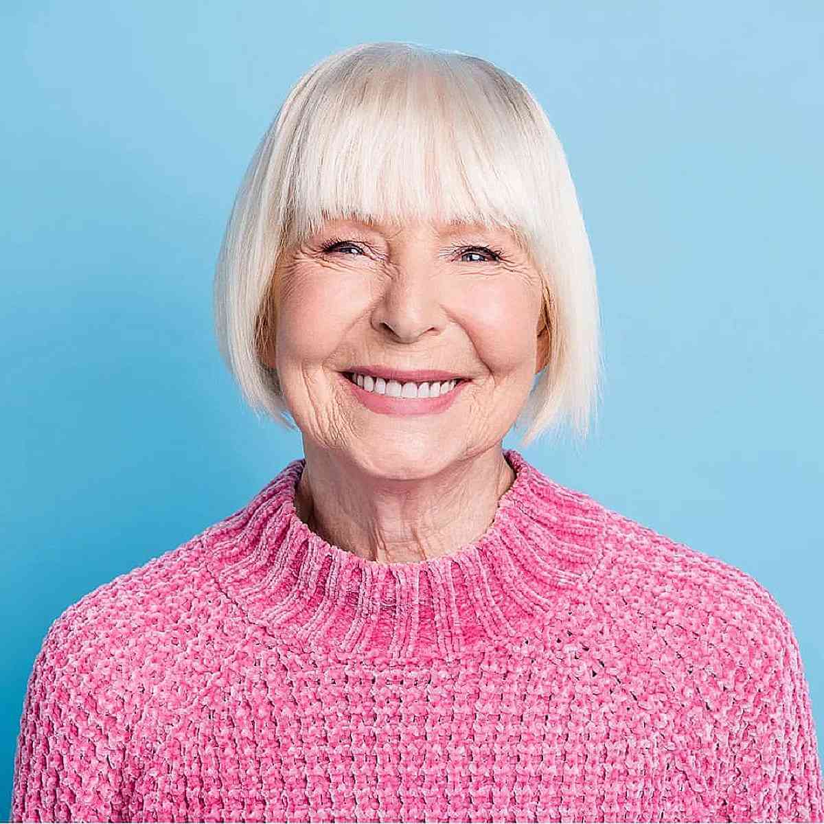 chin length straight bob for women aged 70 with bangs