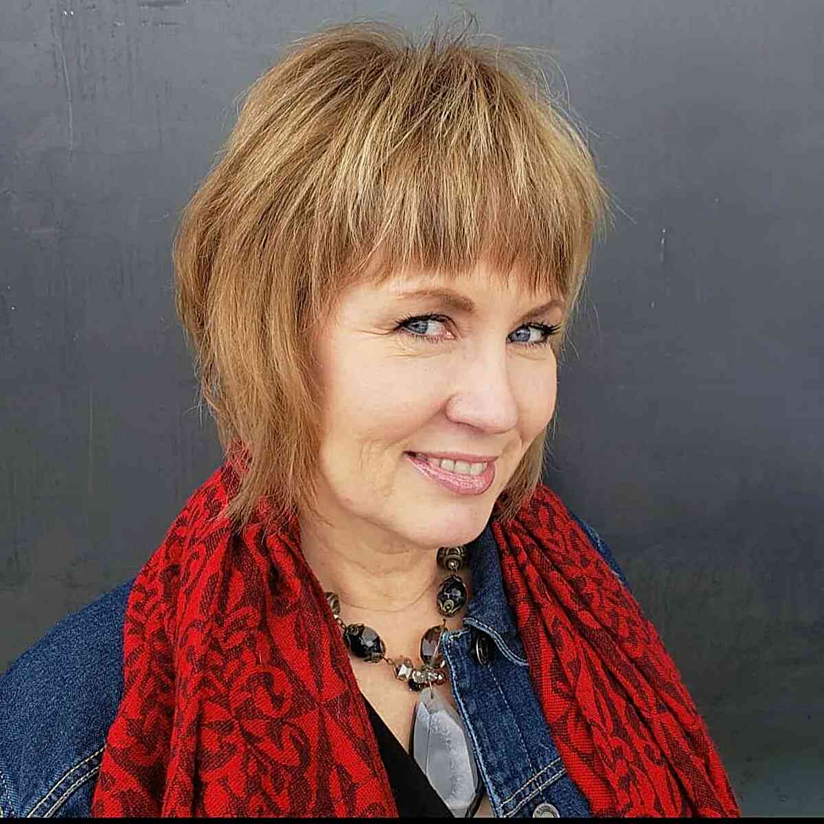 chin length straight shag with full bangs for older women