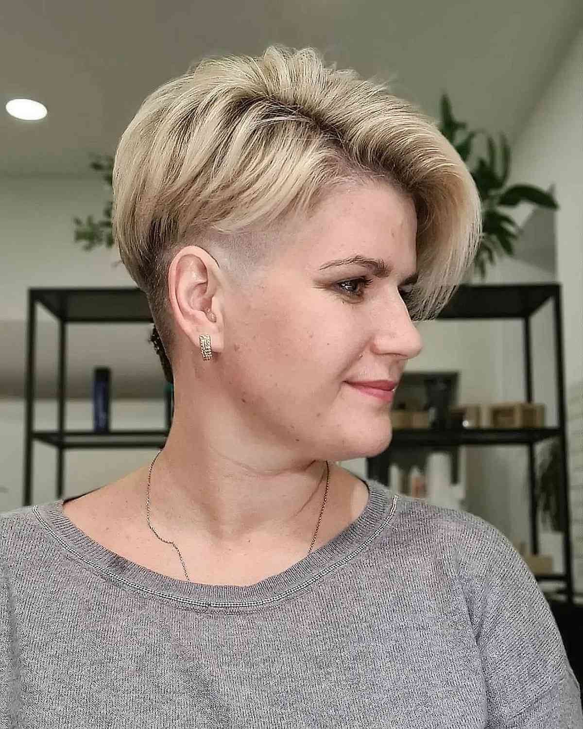 creamy blonde pixie bob with an undercut