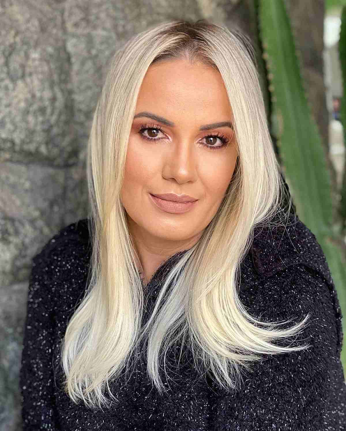 creamy blonde with dark roots for women 40 and over with fine hair