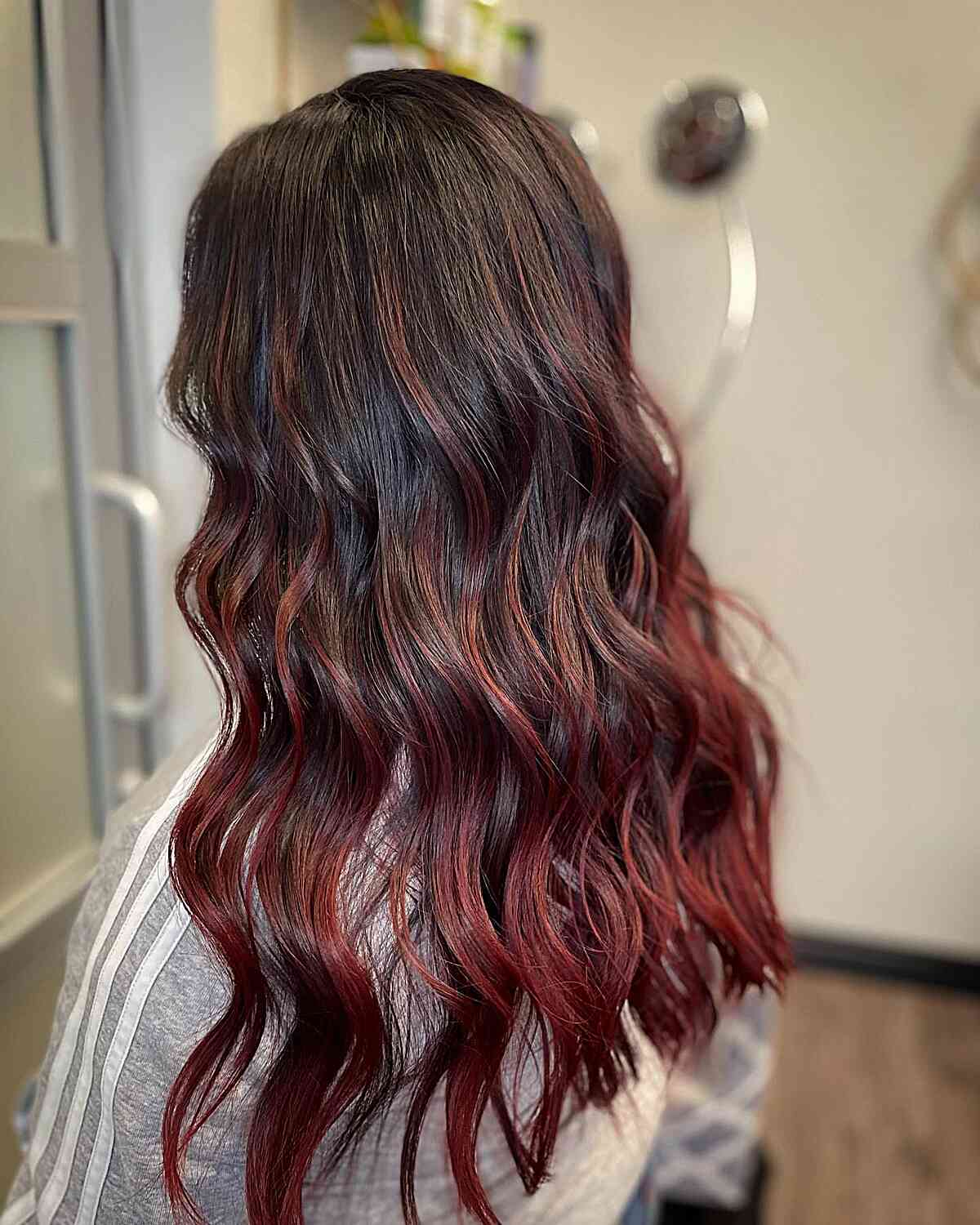 dark brown rooted red balayage ombre