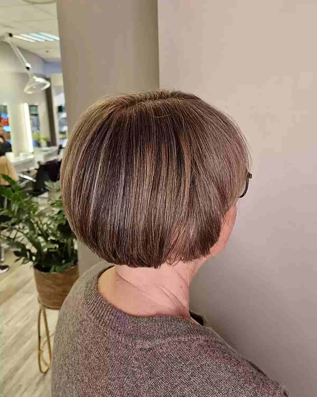 dimensional brown for jaw length rounded bob on mature ladies over 60