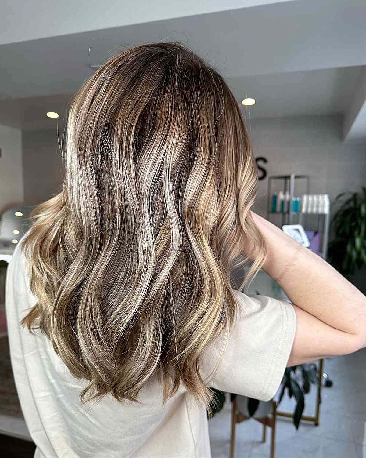 dirty blonde balayage highlights and lowlights with root melt
