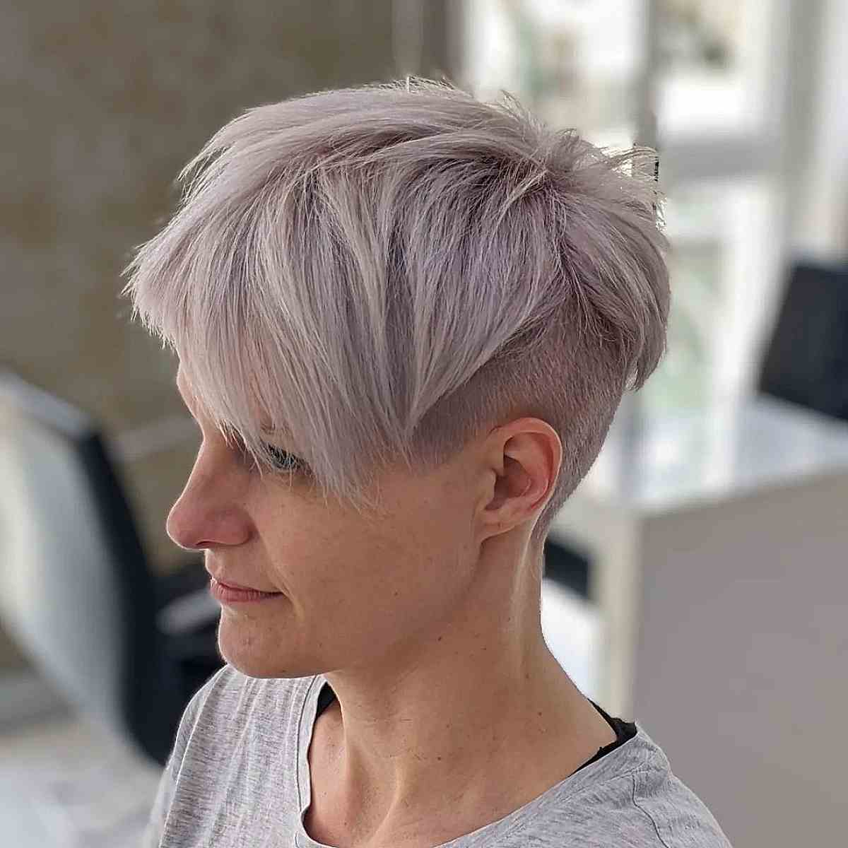 disconnected undercut on platinum pixie hair