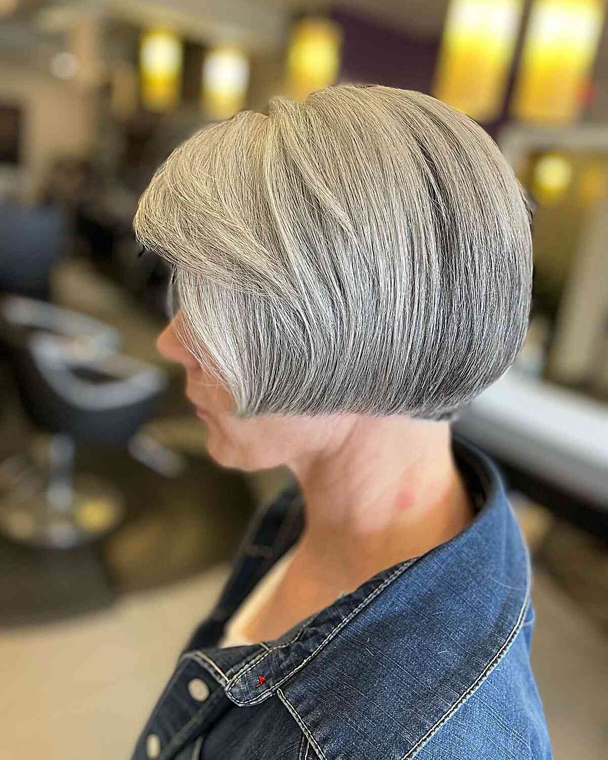 edgy short jaw length bob with straight edges for women over sixty