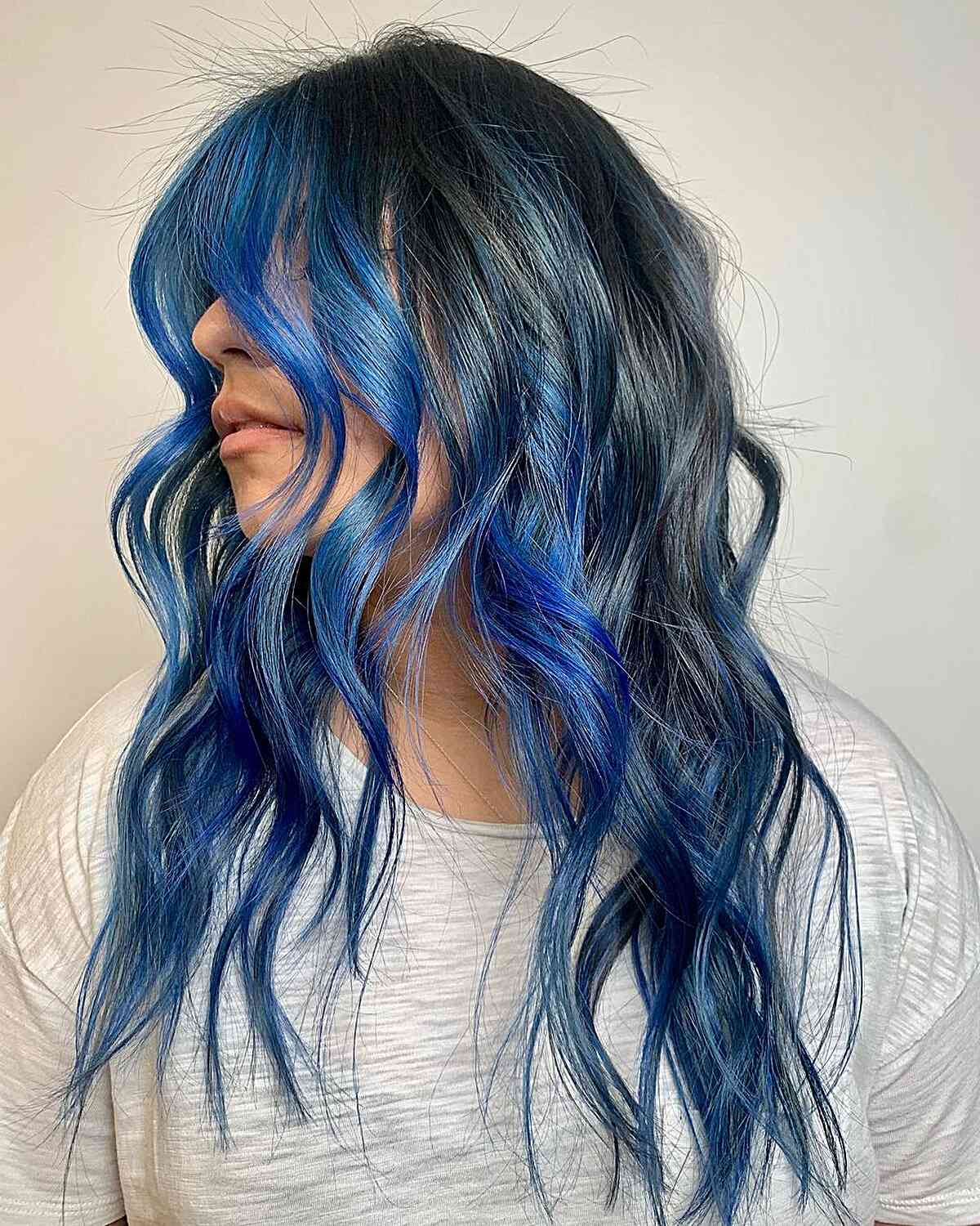 face framing electric blue balayage highlights