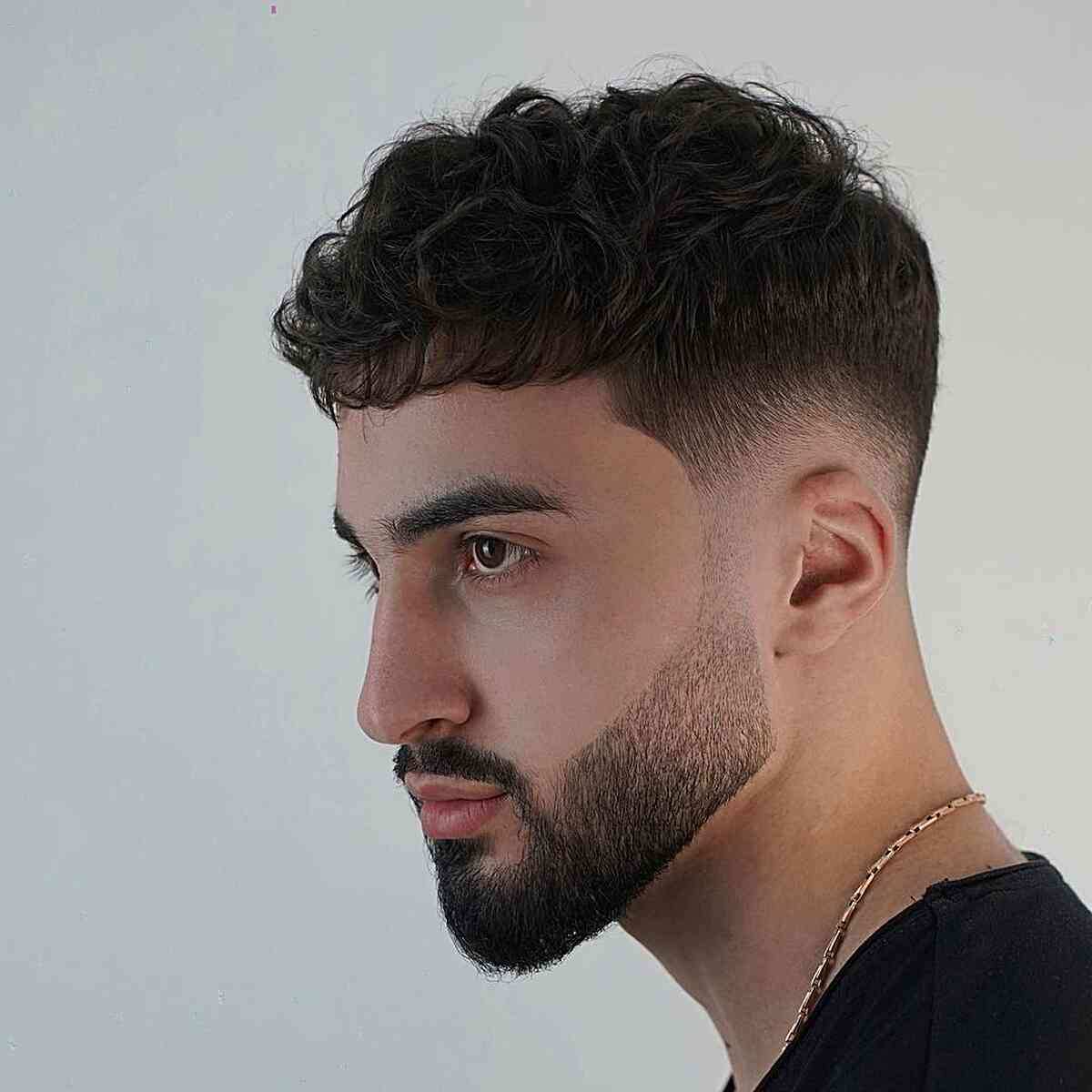 faded curly edgar cut with subtle bangs on boys