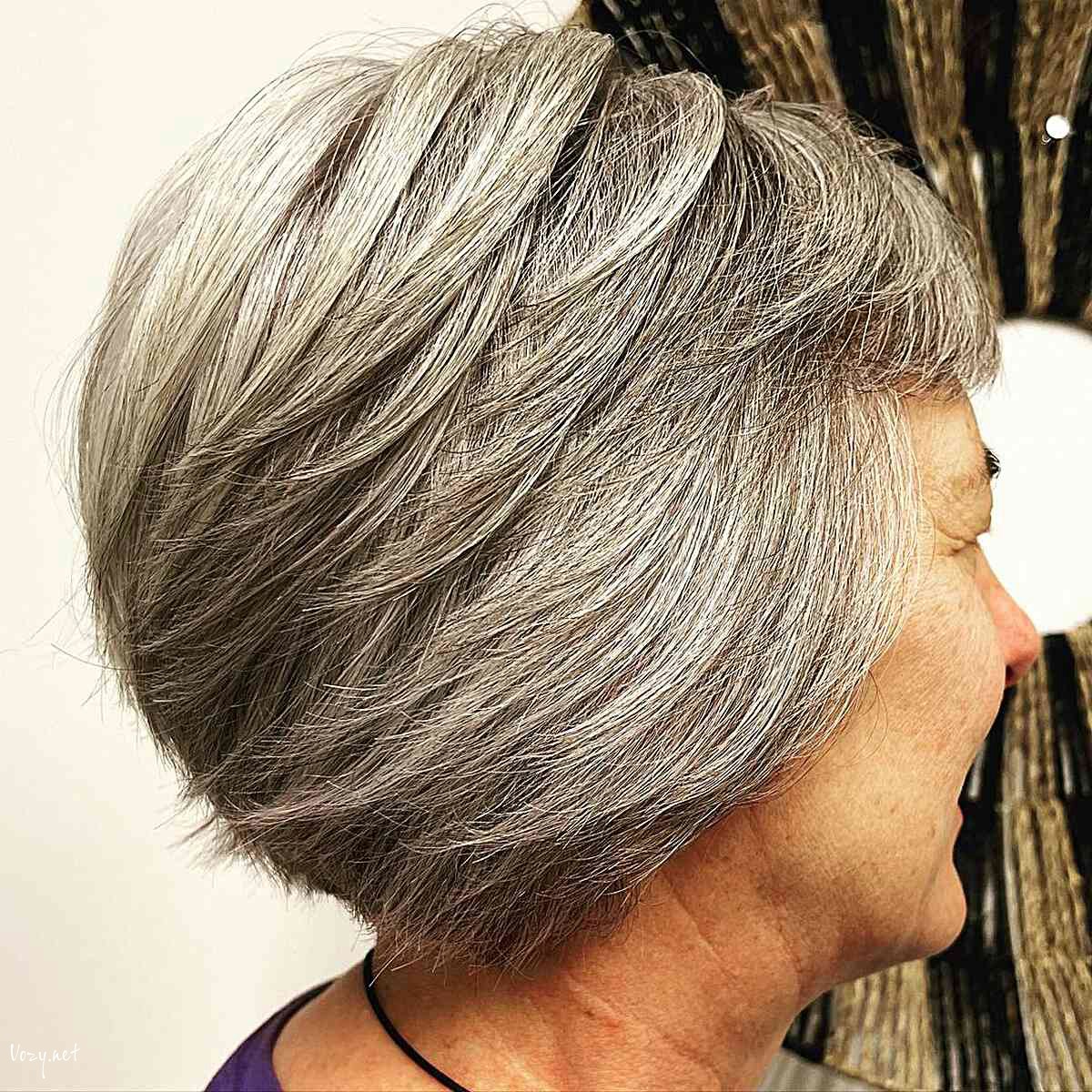 feathered mini gray pixie bob with choppy layers for women over the age of 60