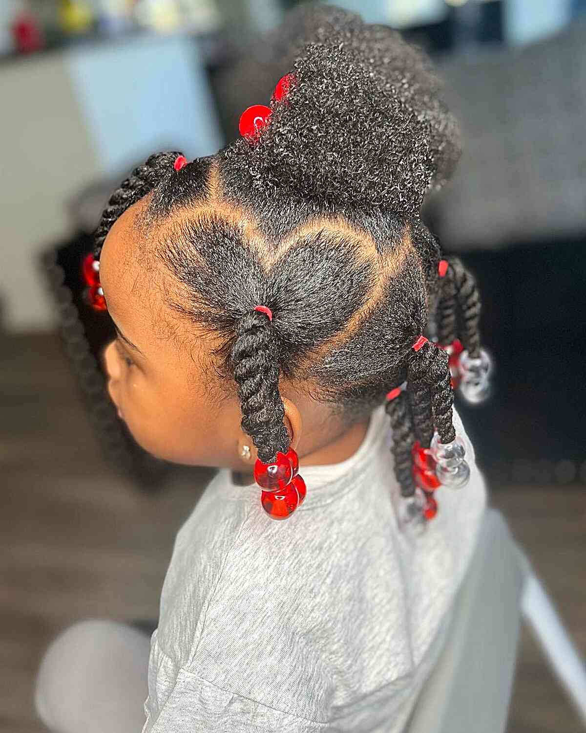 heart parted rope braids with hair puff for black kids afro