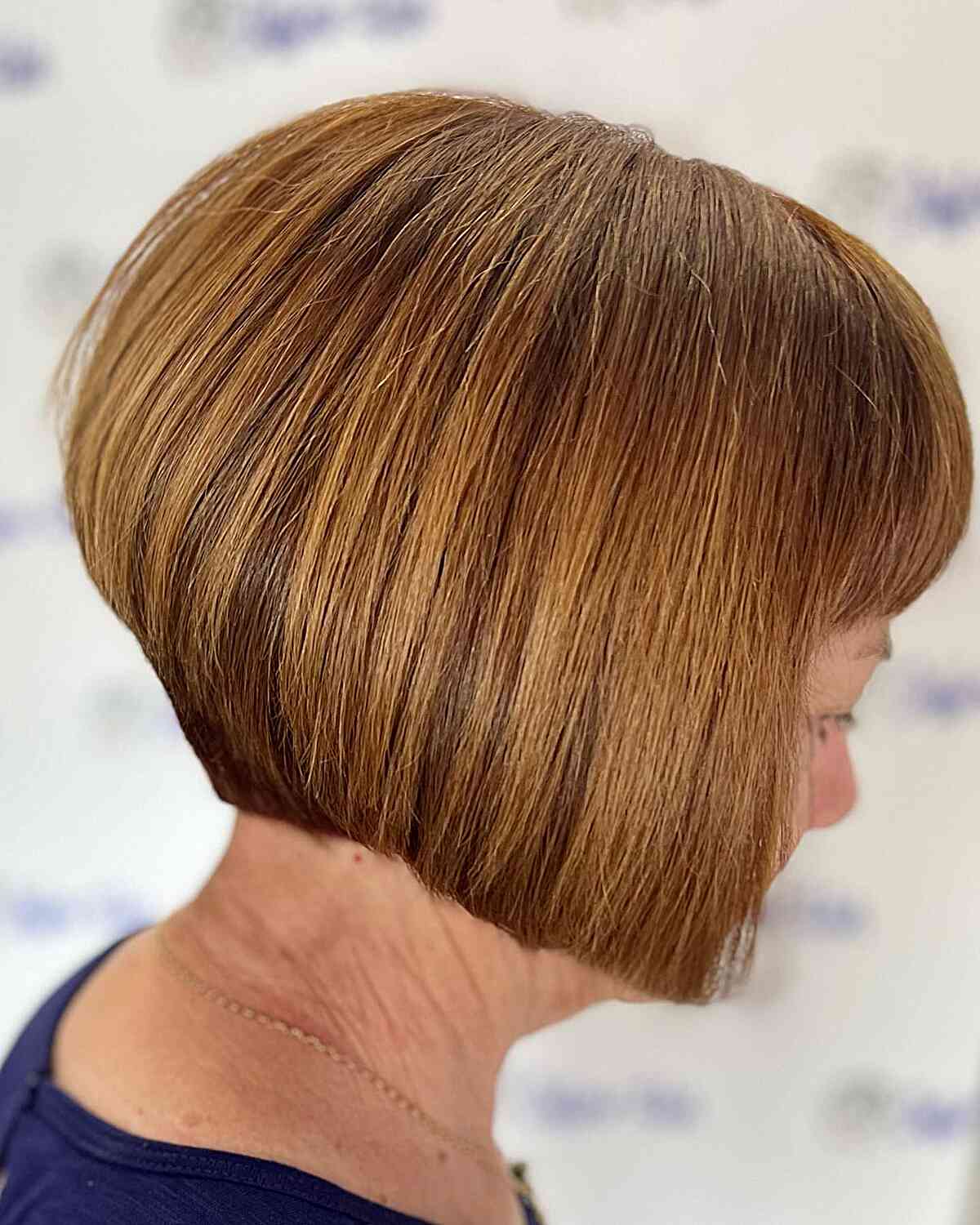 jaw length brown concave bob with fringe for older ladies over sixty