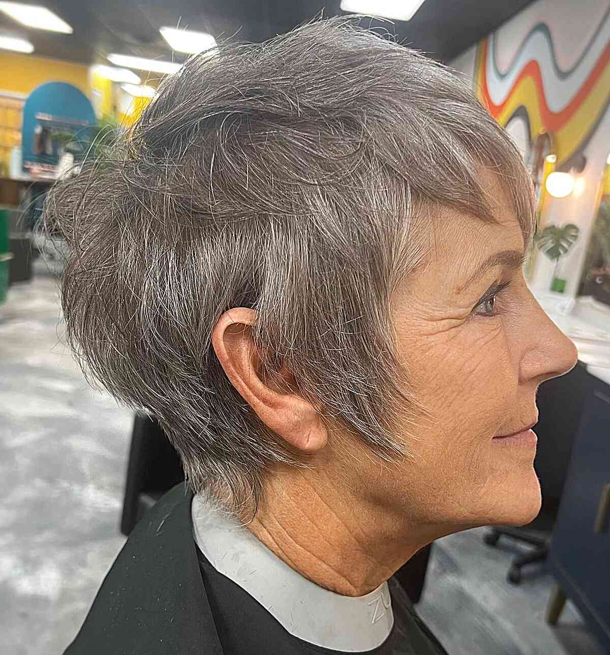 jaw length tousled razor cut pixie with layers on senior women over 60