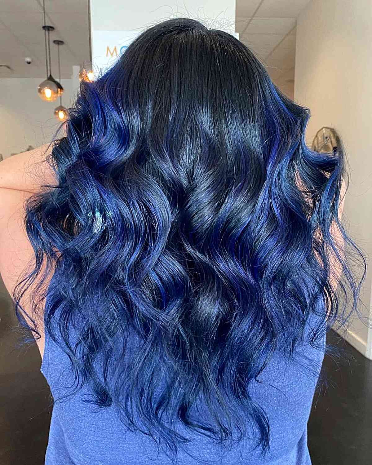 long length royal blue balayage waves with dark base