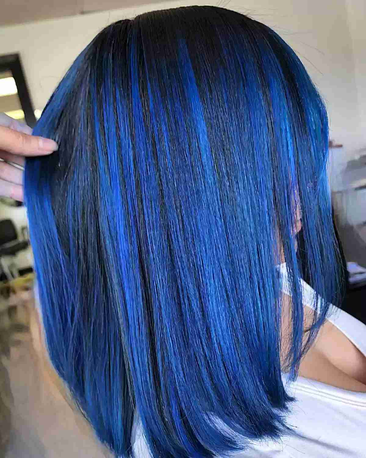 low maintenance rich blue balayage highlights on dark roots