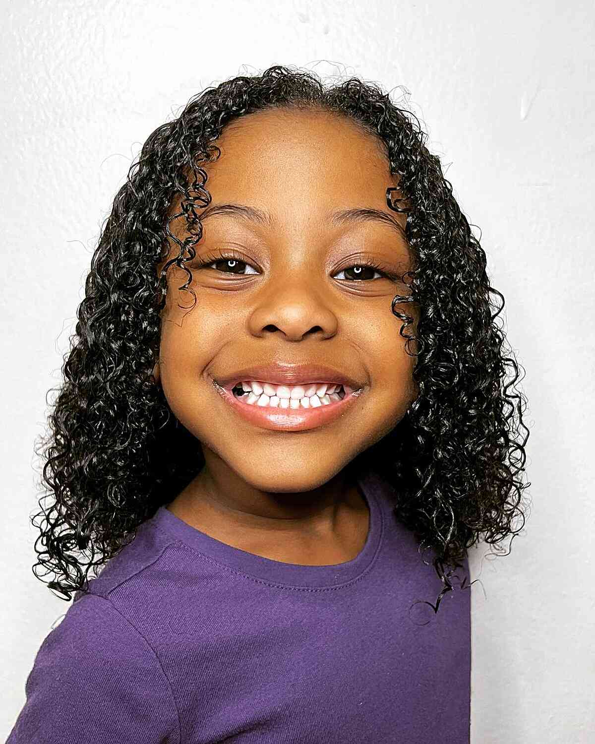 medium length layers for black girls sleek kinky hair