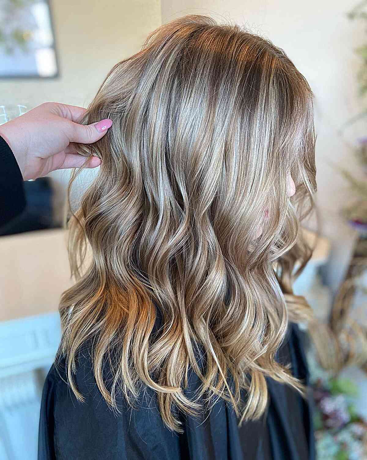 medium length rich dirty bronde balayage hair