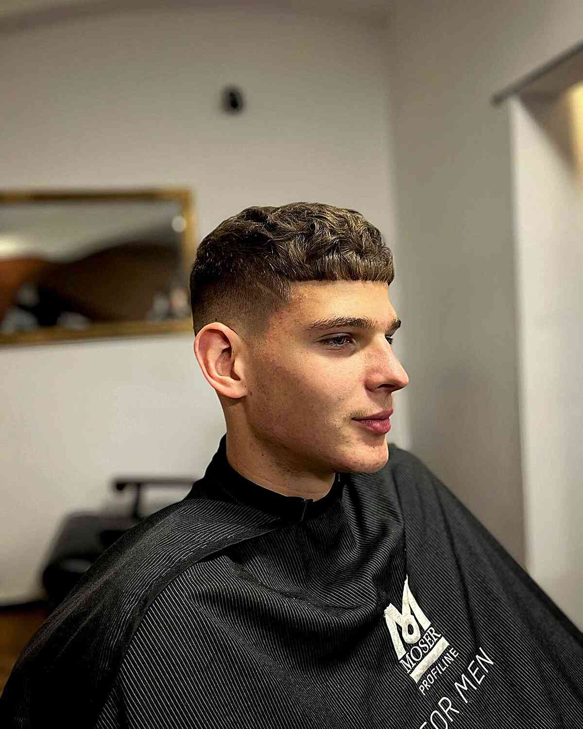modern edgar cut for guys with wavy hair
