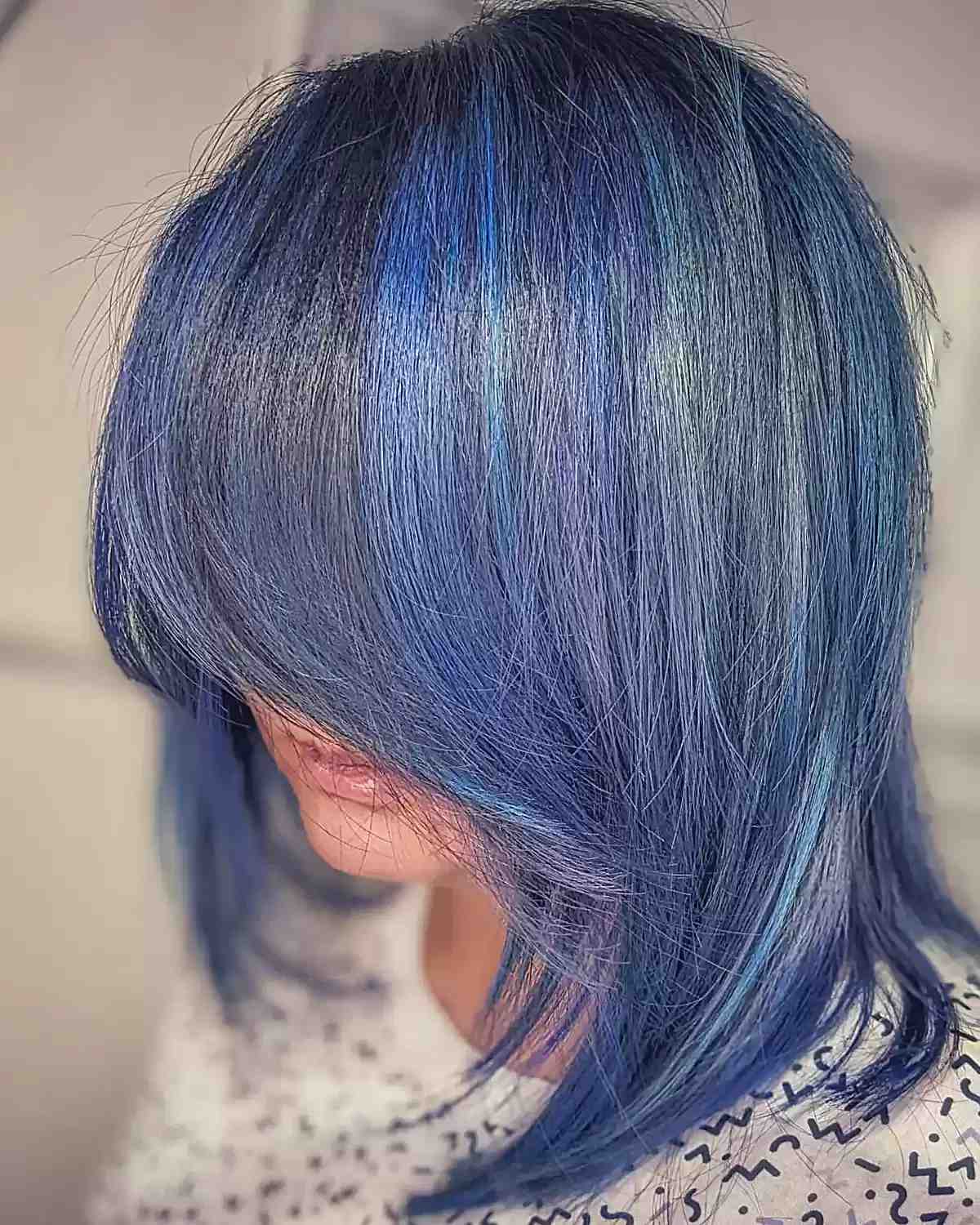 muted blue balayage and purple hues