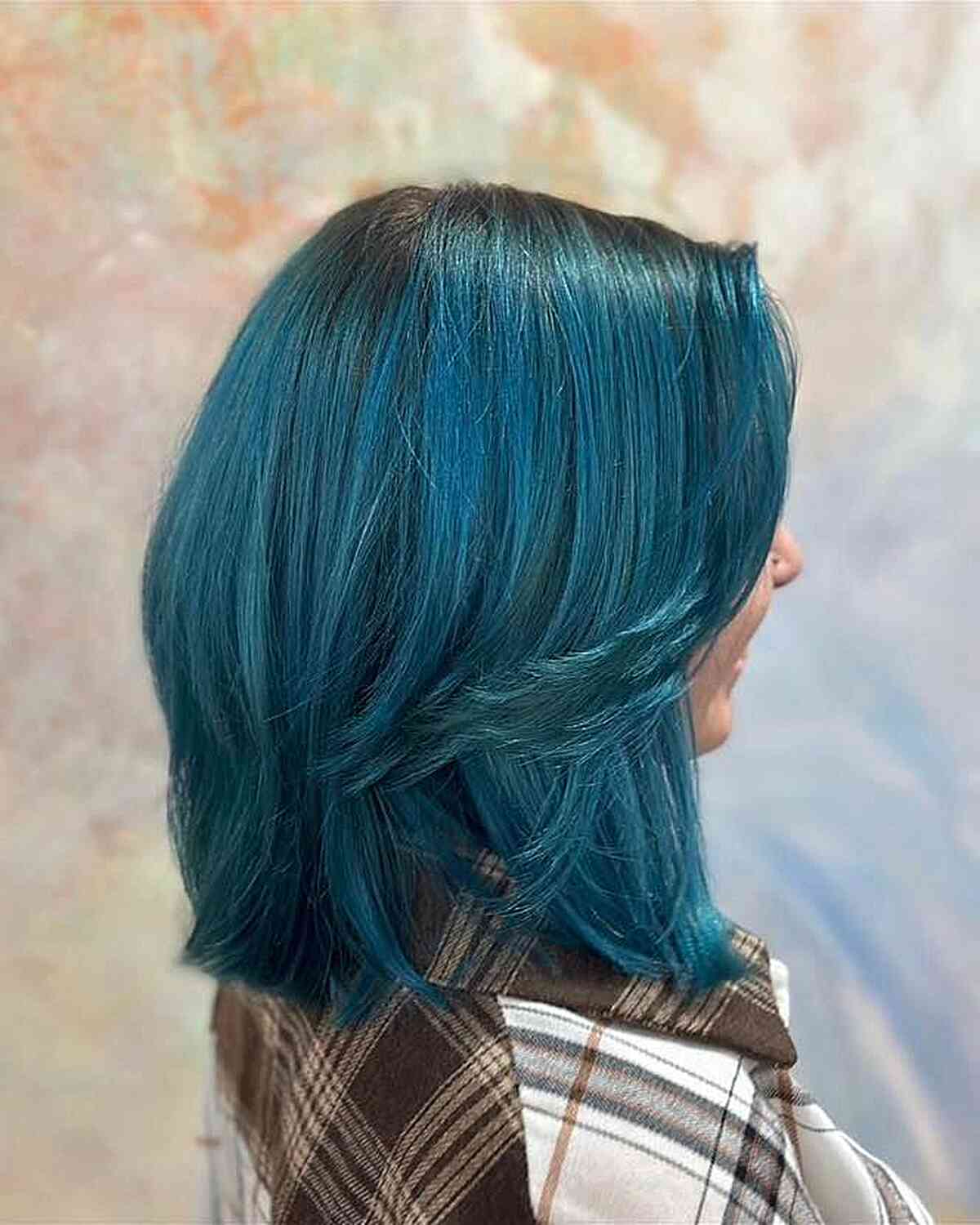 painted blue green balayage with shadow root