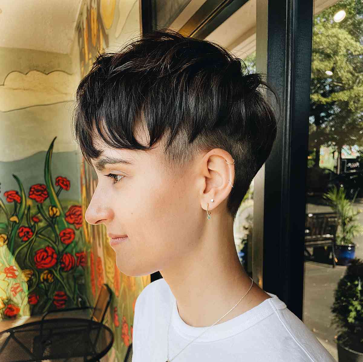 perfectly disheveled undercut pixie with bangs