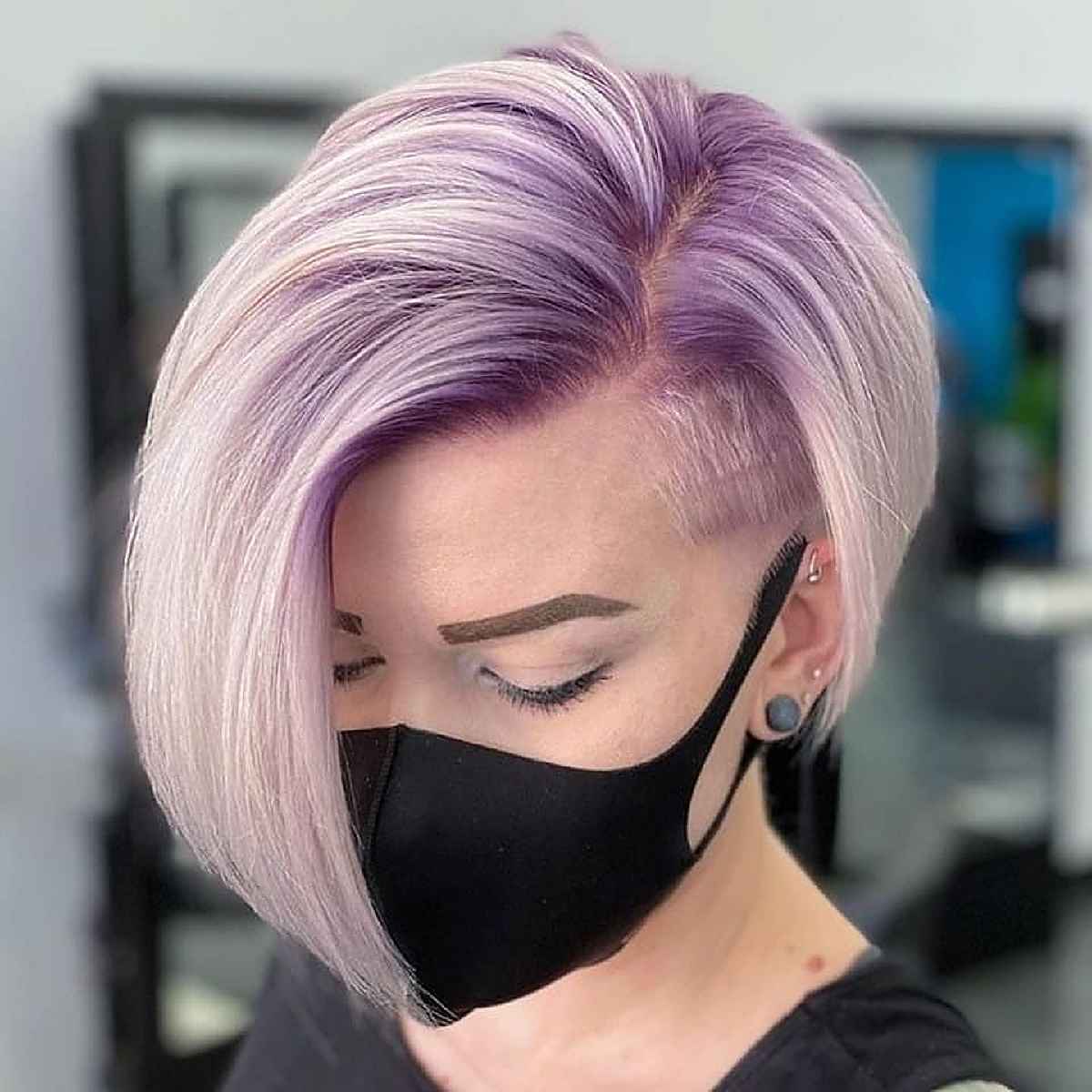 purple roots on a stepped undercut pixie bob