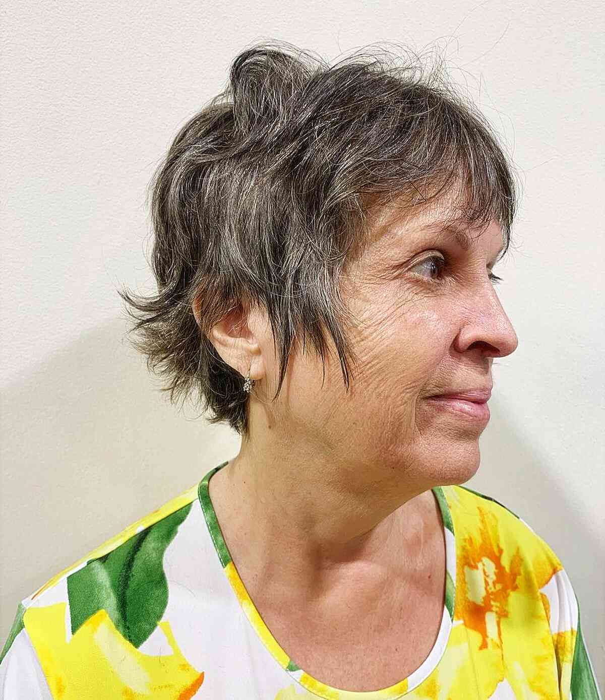 razored pixie shag haircut with soft messy texture for old ladies
