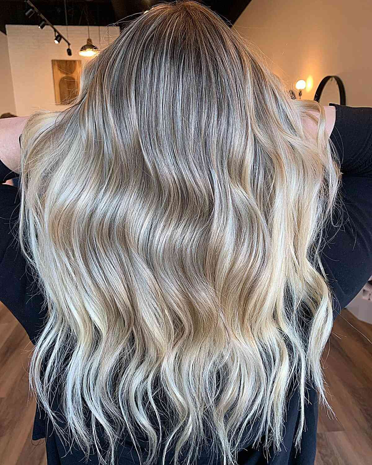 rooted platinum dirty blonde balayage