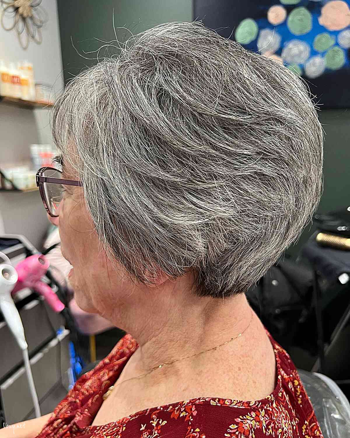 salt and pepper feathered bixie with soft layers for women 60s and up