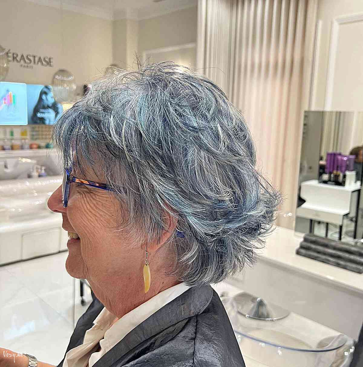sassy short hair with feathered choppy layers and balayage for seniors over 60