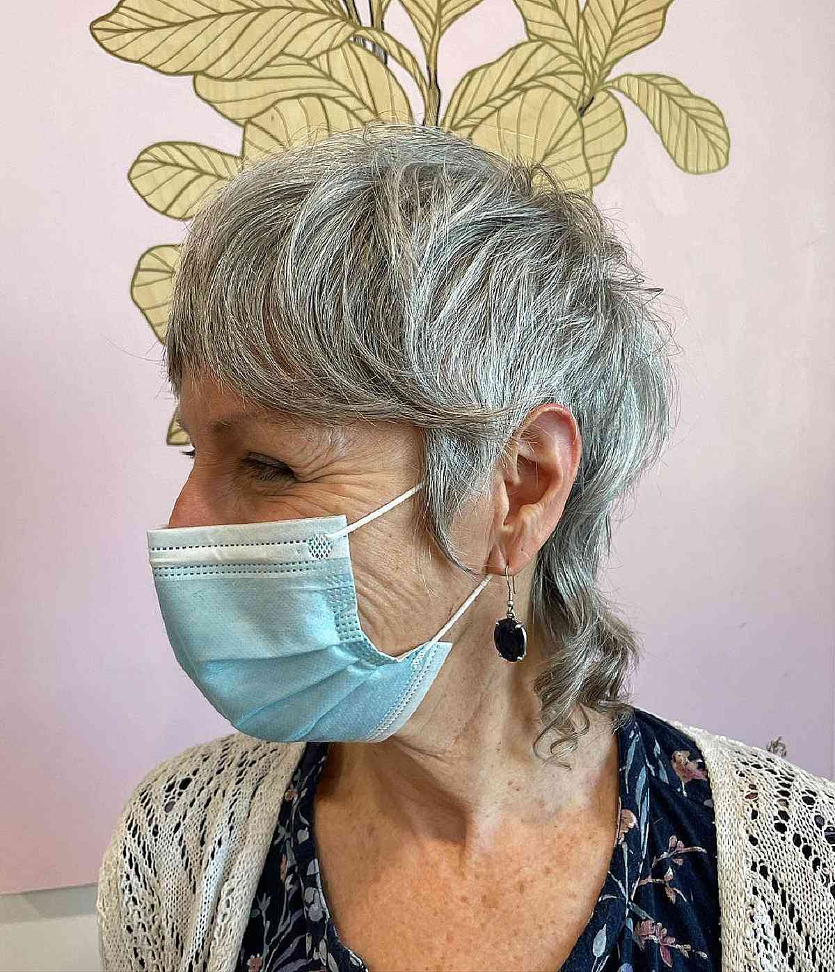 shaggy mixie hair for woman over seventies with curtain bangs