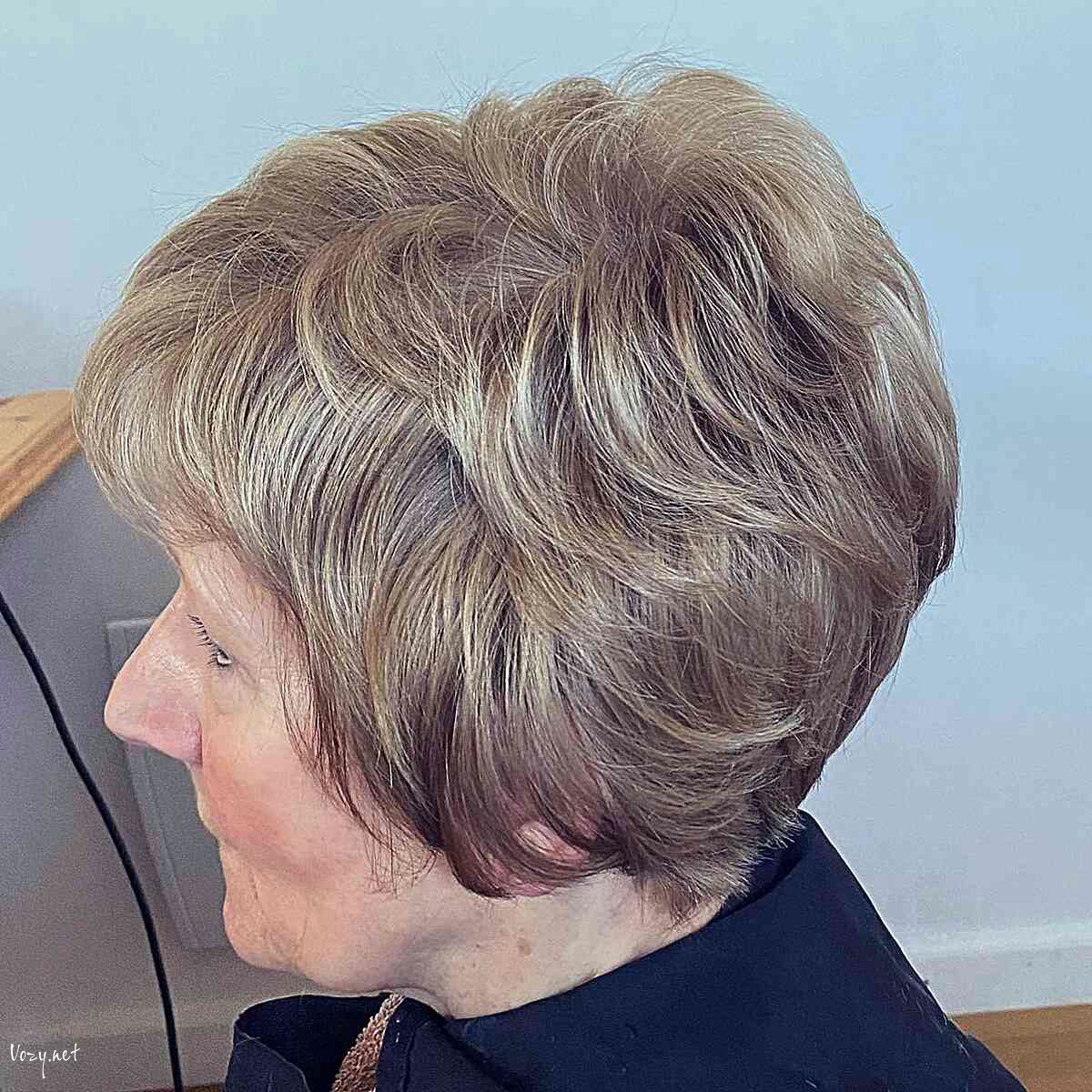 short beige blonde feathered pixie hair for ladies in their 60s
