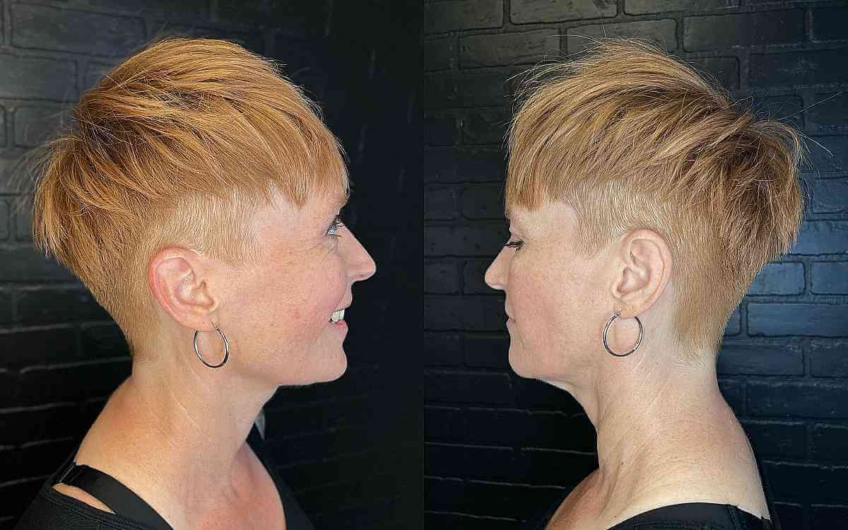 short copper undercut pixie with bangs