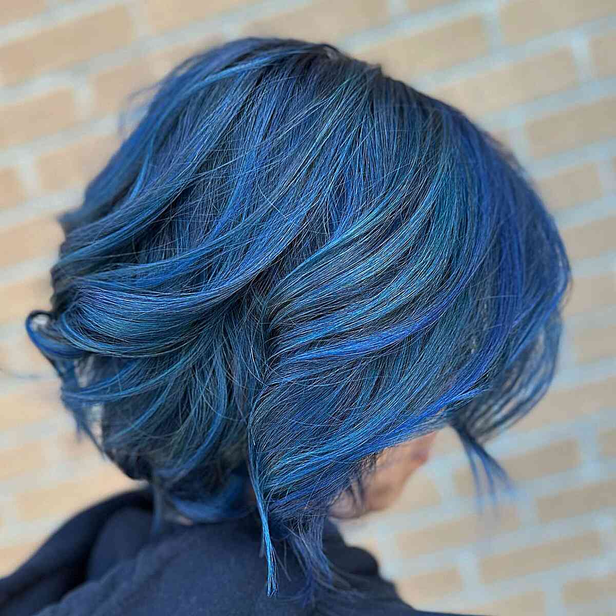 short dimensional blue balayage bob