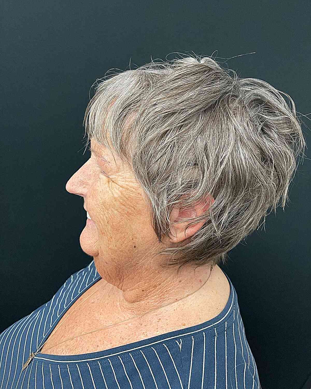 short grey pixie shag with wispy bangs for old ladies