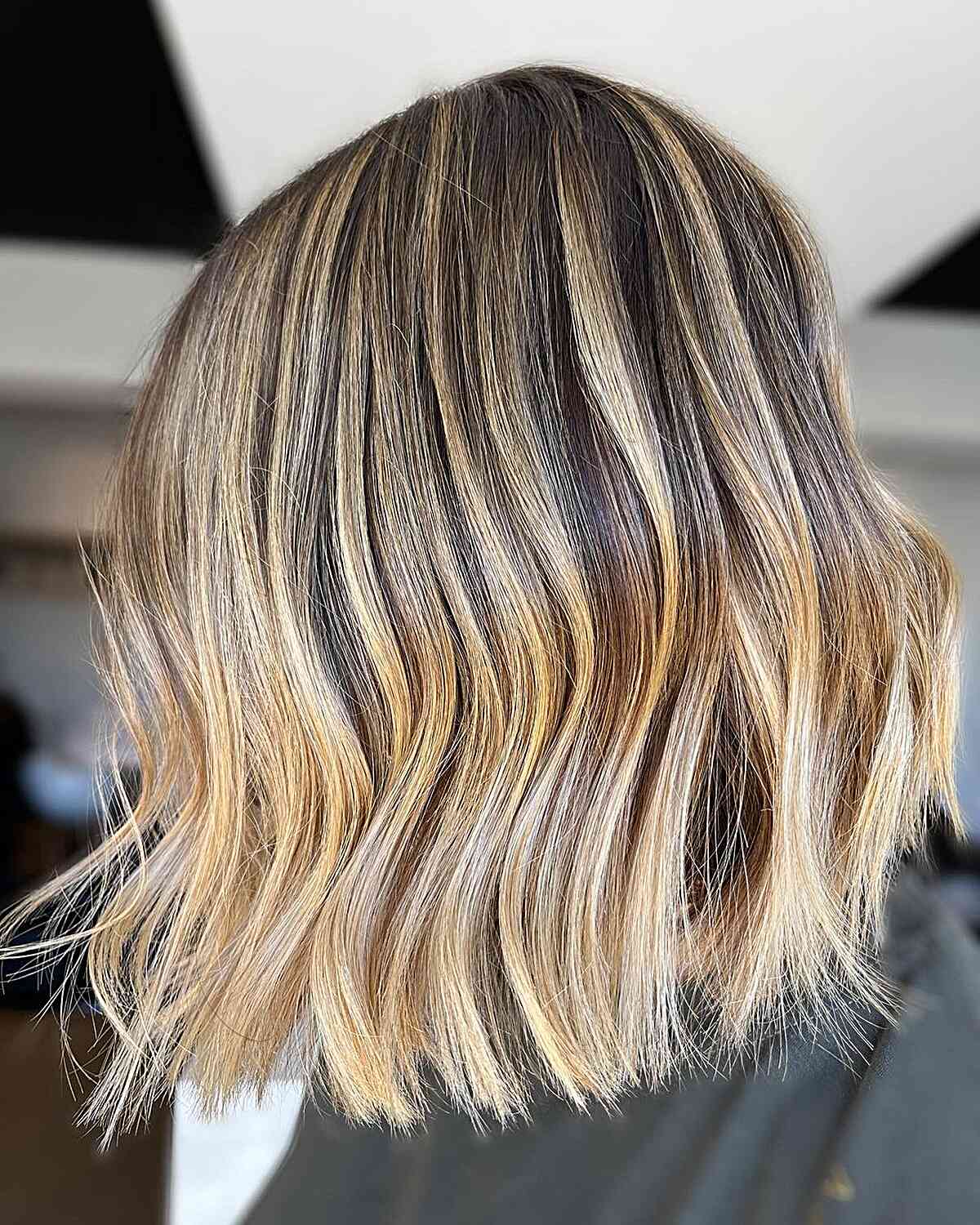 short hair with light dirty blonde chunky balayage highlights