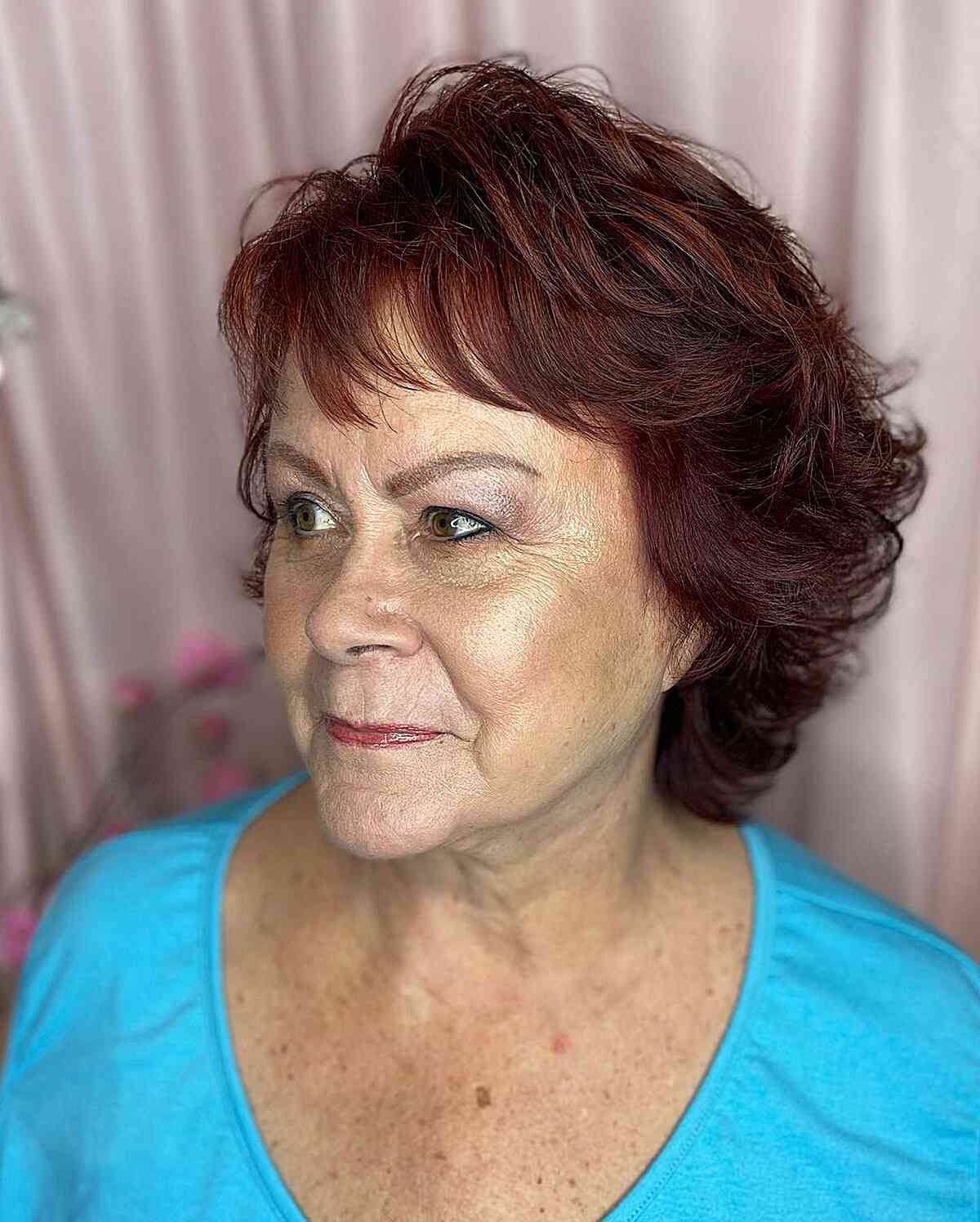 short red blowout shag for thick hair on senior women