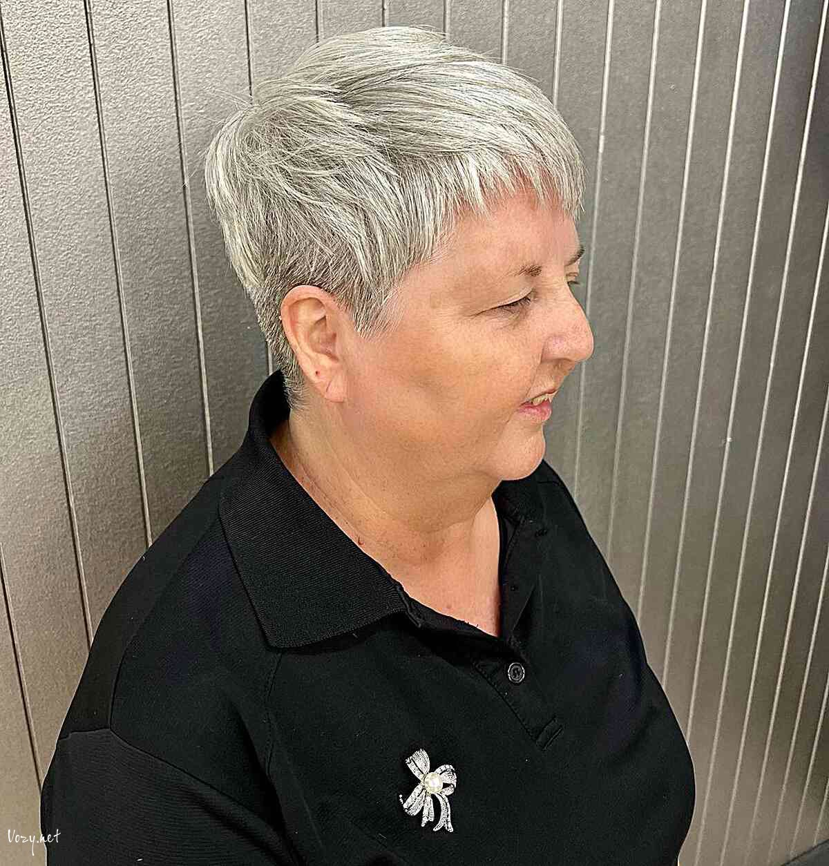 short tapered feathered pixie hair with choppy bangs for older ladies over 60