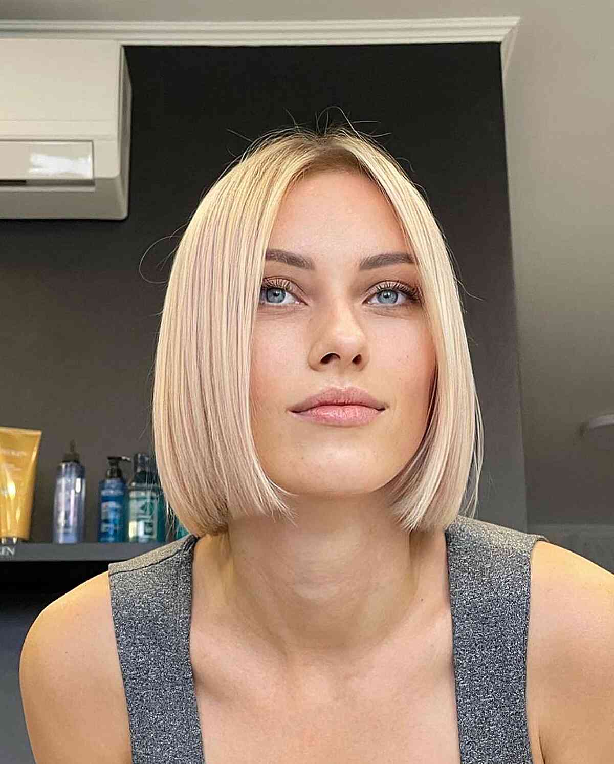 short vanilla blonde center parted slob hair