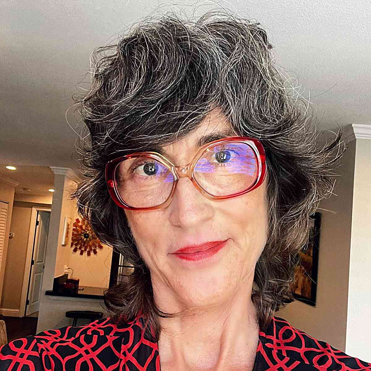short vintage shullet with side swept bangs on older ladies