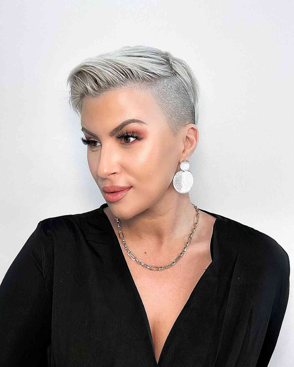 sleek undercut pixie with a shaved side