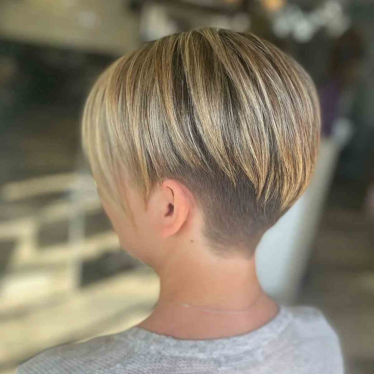 sleek undercut pixie with balayage