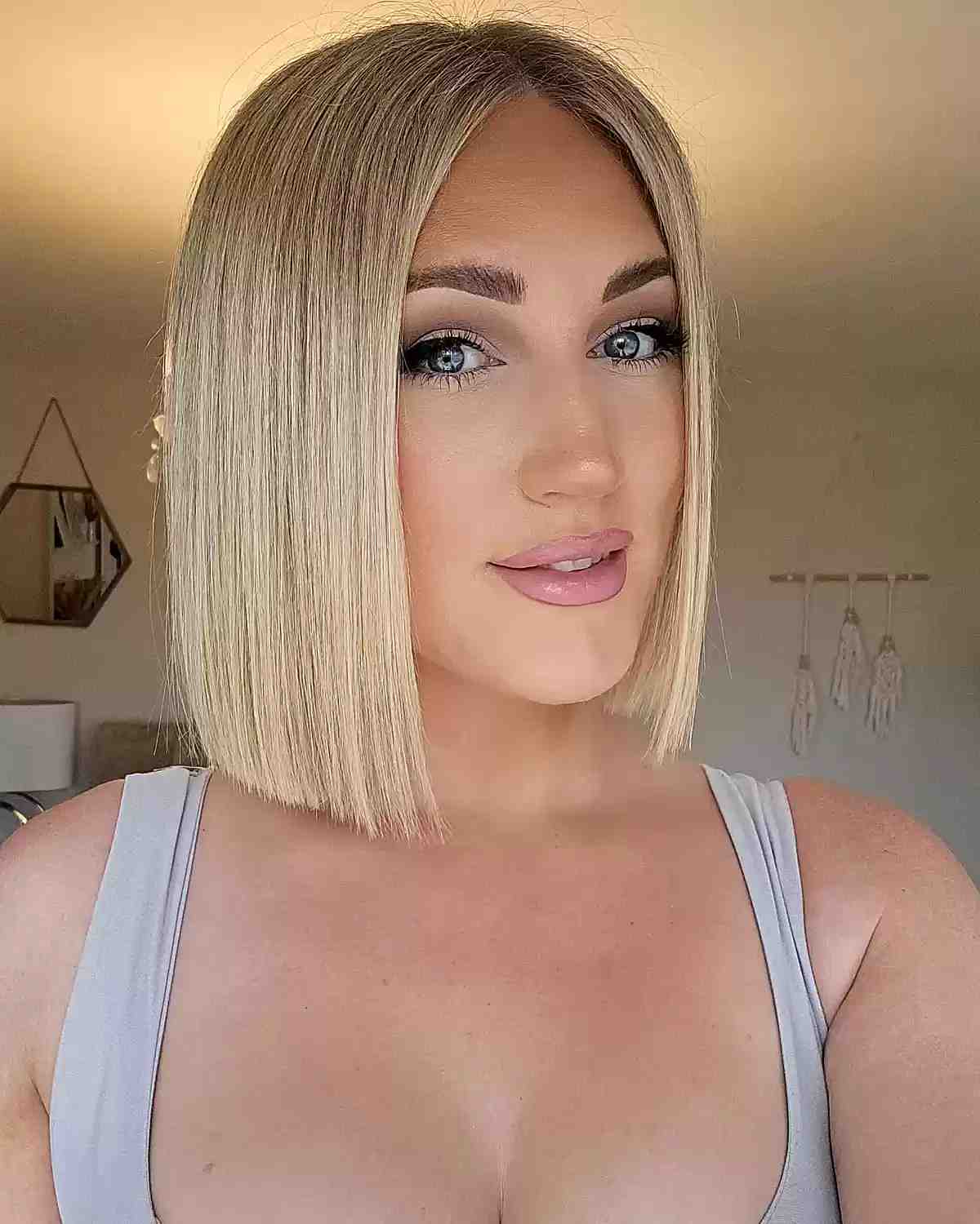 slob cut with middle parted short fine hair