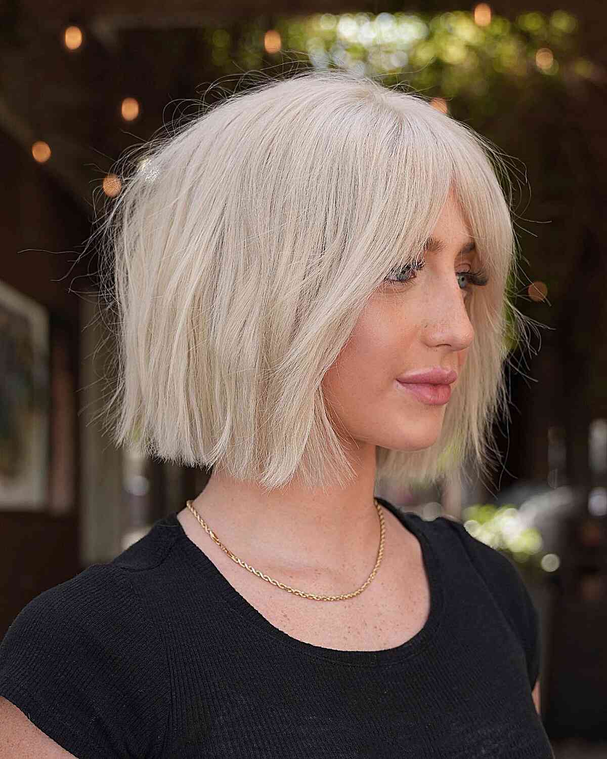 soft tousled slob with curtain bangs