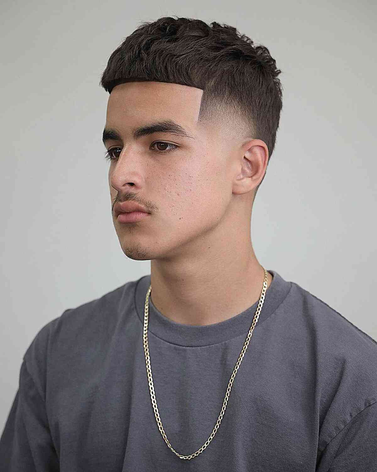 takuache edgar cut with wavy top for men