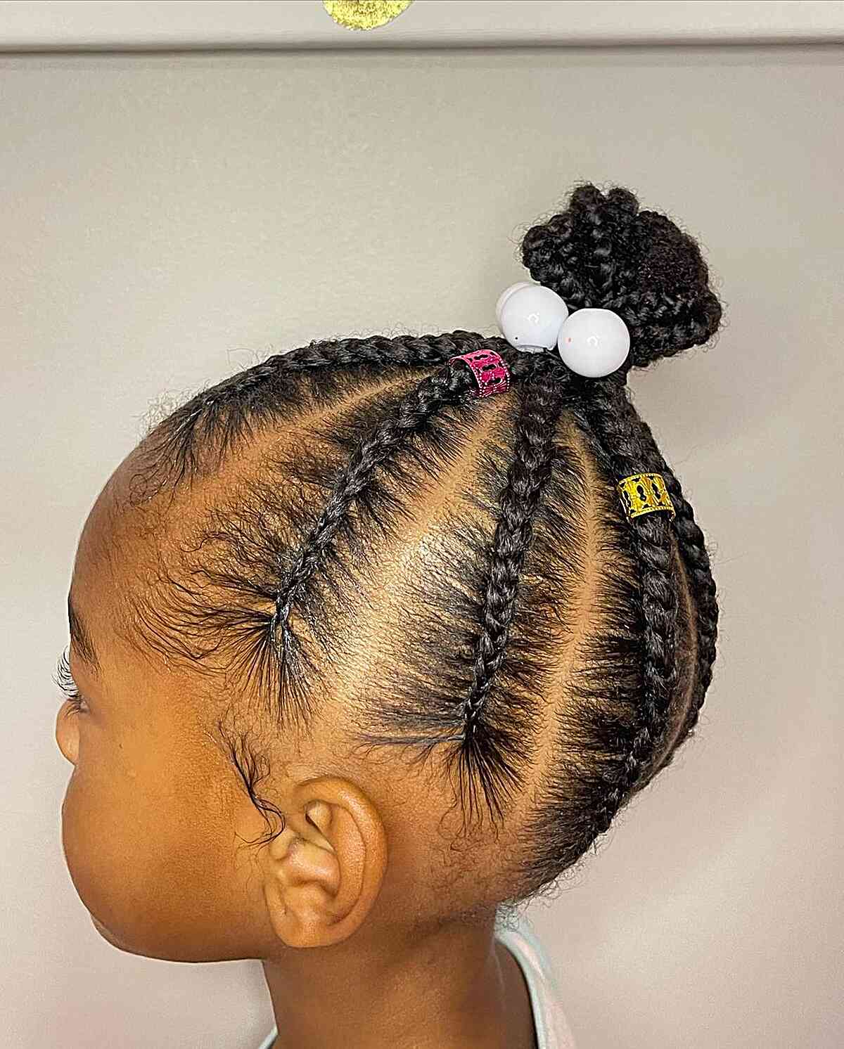 top bun and braids with cuffs for kids black hair