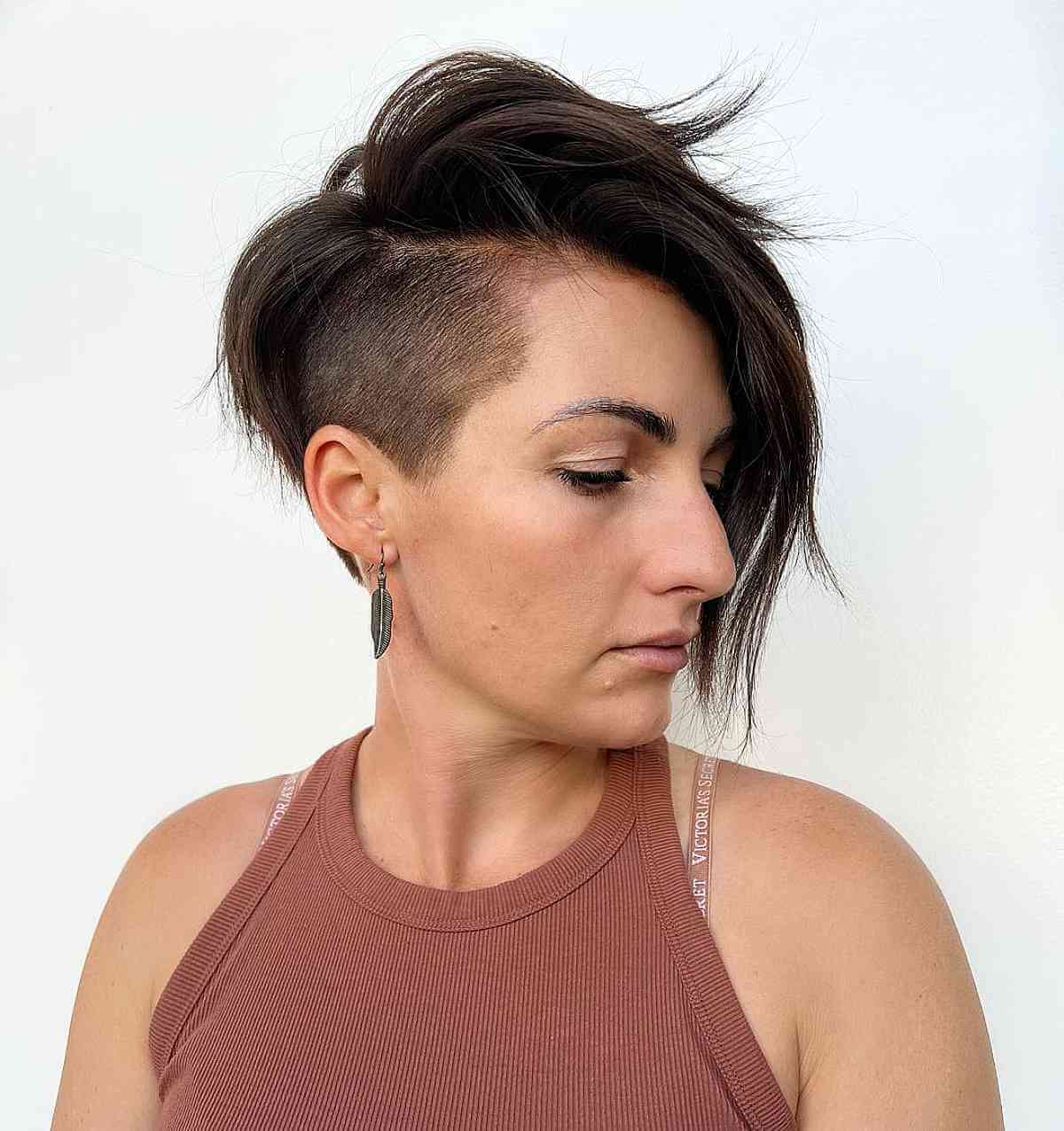 undercut asymmetric brunette haircut