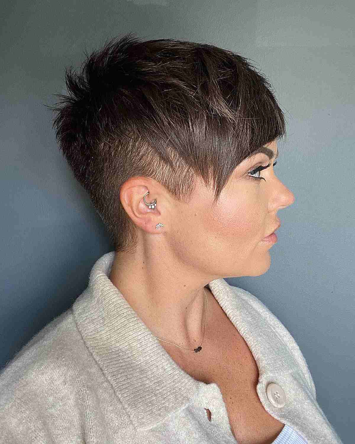 undercut fade with side swept bangs
